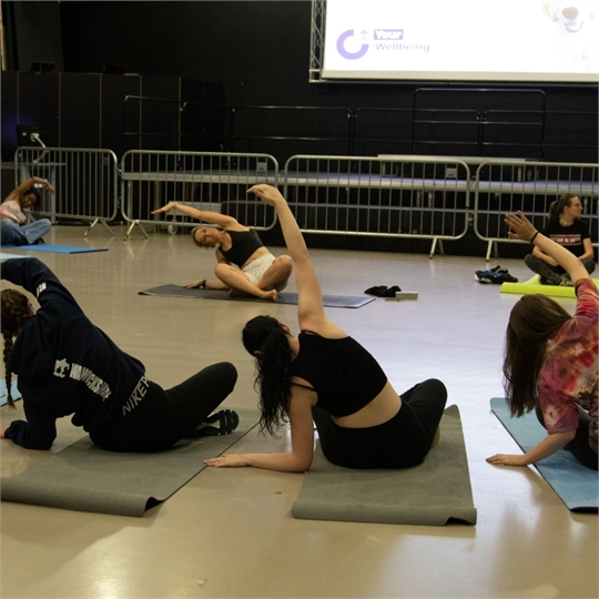 Students enjoying joga workshop.