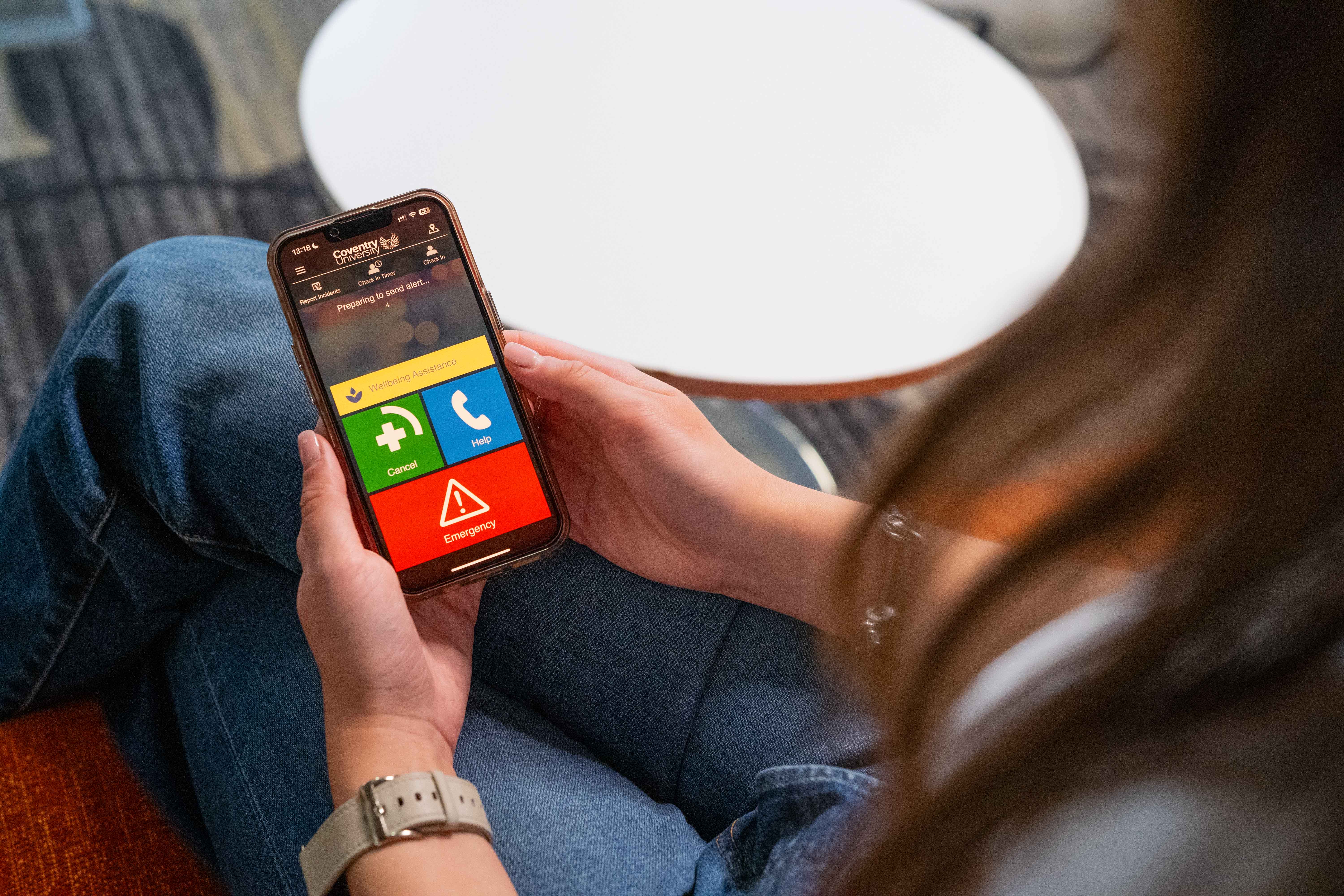 Close up of the SafeZone app on a mobile phone.