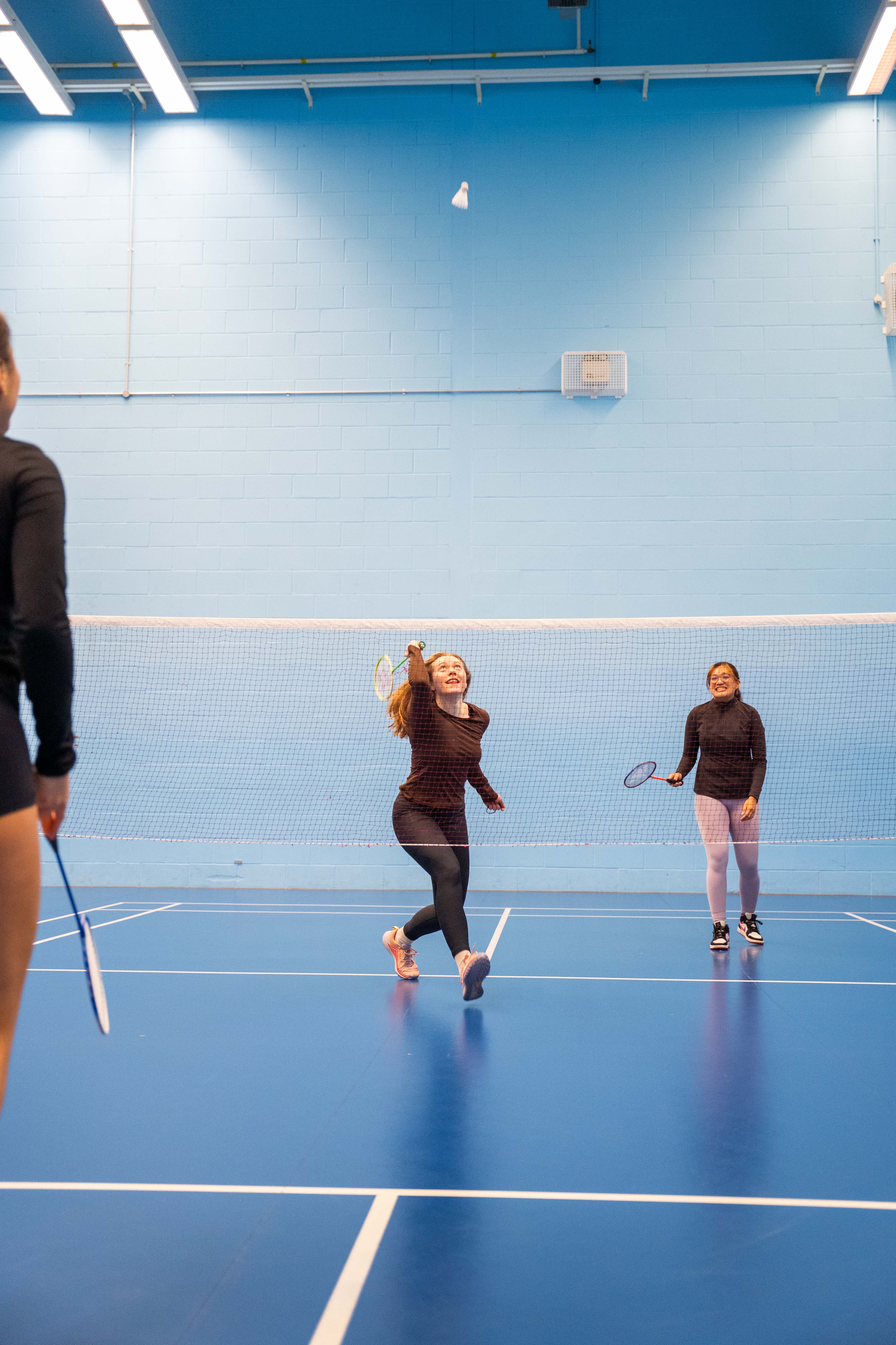 People playing badminton