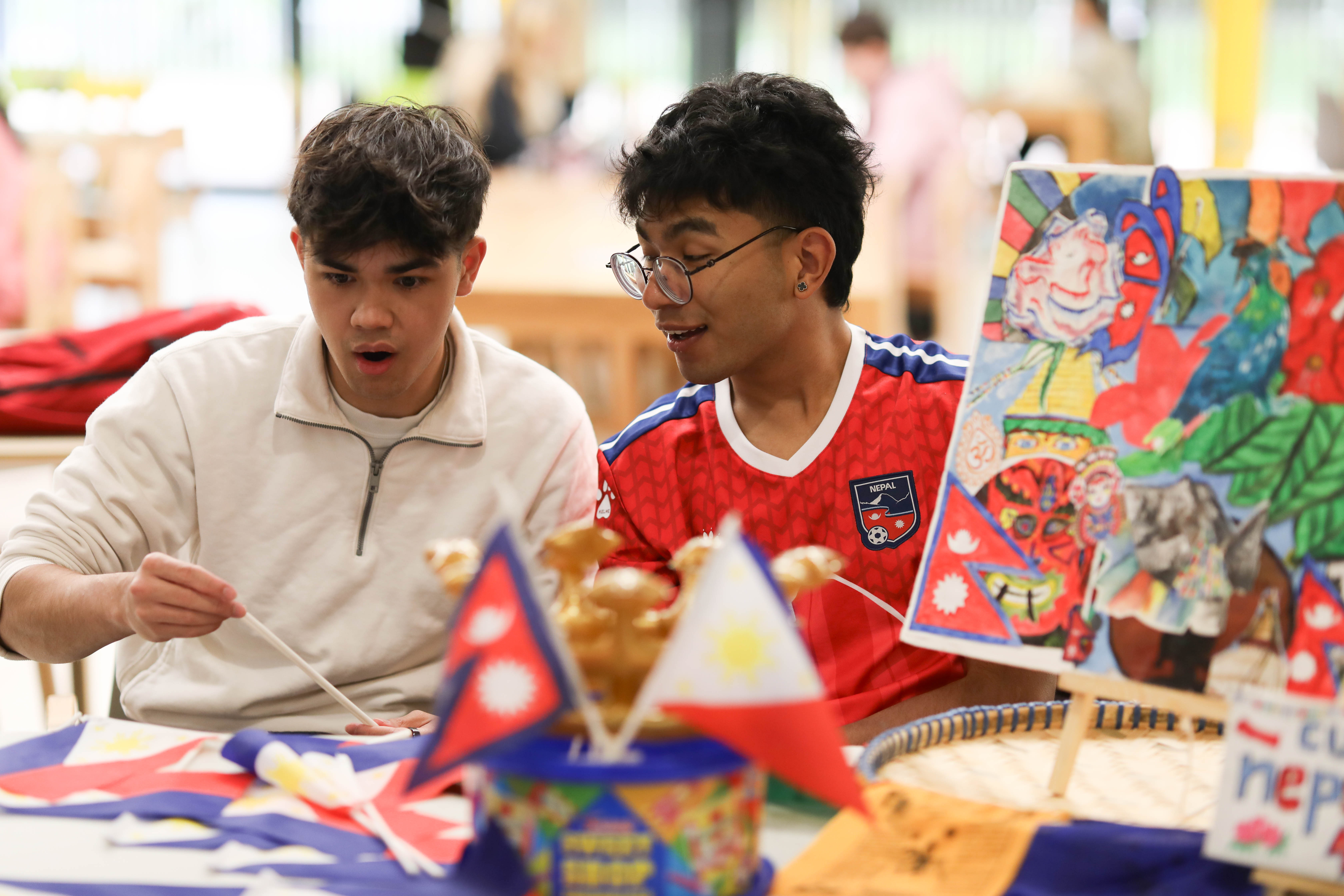 Two people looking surprised at something.